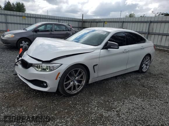 2015 BMW 4 Series 428i xDrive z VIN WBA4C9C5XFD331770, wystawiony jako Copart lot #68122435 z przebiegiem 85 140 mil mil oraz Szkoda całkowita • Salvage title. Historia ofert i sprzedaży dostępna na DreamBid. Obrazek 1.