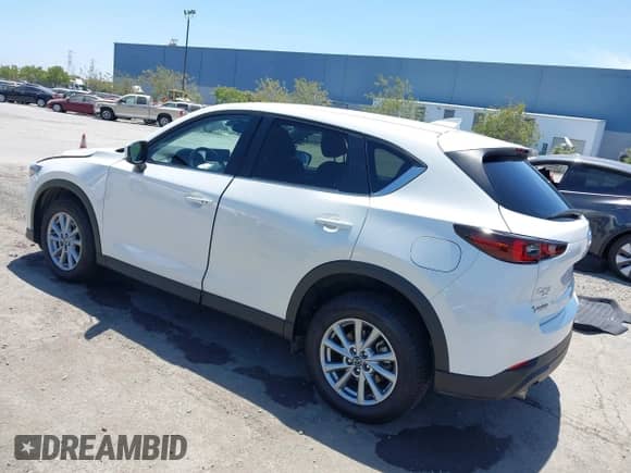2023 Mazda CX-5 S Carbon Edition z VIN JM3KFBCM9P0286384, wystawiony jako IAAI lot #42497951 z przebiegiem 9 448 mil mil oraz . Historia ofert i sprzedaży dostępna na DreamBid. Obrazek 3.