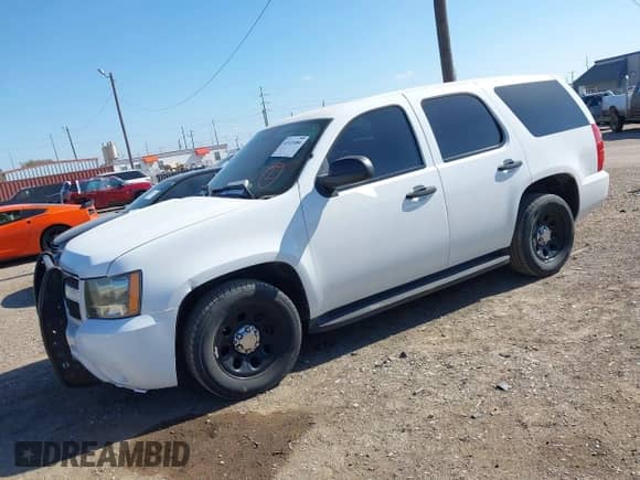 2013 Chevrolet Tahoe Commercial with VIN 1GNLC2E07DR239921, listed as a IAAI auction lot 43121086 with 116,427 mi miles and . Bid and sale history available at DreamBid. Image 2.