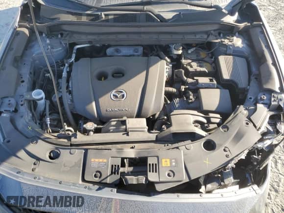 2023 Mazda CX-5 S Carbon Edition с VIN JM3KFBCM6P0179020, выставлен на аукционе Copart как лот 70706485 с пробегом 30 675 миль миль и Списание • Salvage title. История ставок и продаж доступна на DreamBid. Изображение 12.