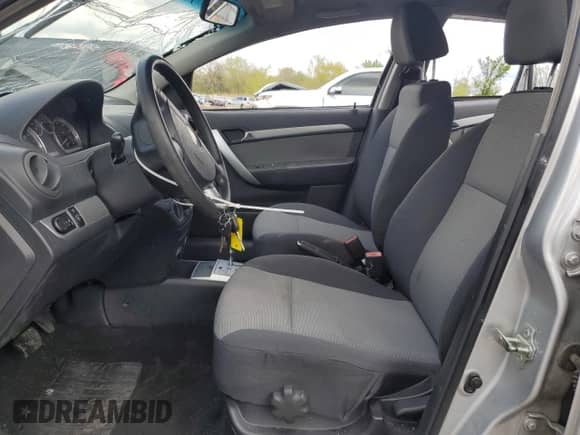 2011 Chevrolet Aveo 1LT z VIN KL1TD6DE3BB199294, wystawiony jako Copart lot #55754725 z przebiegiem 52 606 mil mil oraz Szkoda całkowita • Salvage title. Historia ofert i sprzedaży dostępna na DreamBid. Obrazek 7.