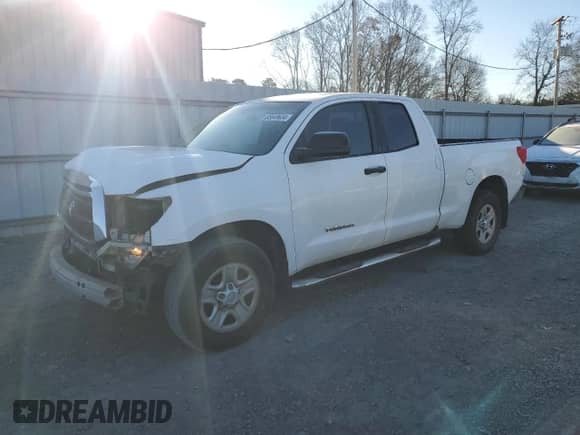 2012 Toyota Tundra z VIN 5TFRU5F1XCX027582, wystawiony jako Copart lot #85649634 z przebiegiem 267 030 mil mil oraz Szkoda całkowita • Salvage title. Historia ofert i sprzedaży dostępna na DreamBid. Obrazek 1.