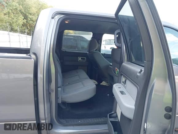 2011 Ford F-150 Lariat with VIN 1FTFW1ET8BFB76490, listed as a IAAI auction lot 43242474 with 165,835 mi miles and . Bid and sale history available at DreamBid. Image 8.