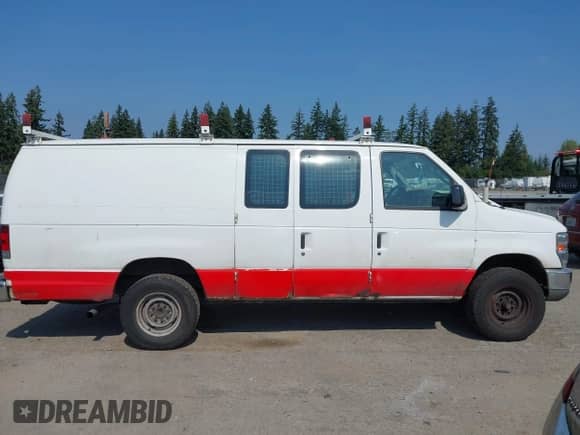 2012 Ford Econoline Cargo Commercial z VIN 1FTNS2EL2CDB27134, wystawiony jako IAAI lot #43182873 z przebiegiem 239 030 mil mil oraz . Historia ofert i sprzedaży dostępna na DreamBid. Obrazek 13.