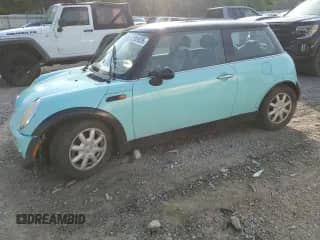 2004 MINI Hardtop with VIN WMWRC33454TJ53599, listed as a Copart auction lot 62895935 with 215,352 mi miles and Salvage title. Bid and sale history available at DreamBid. Image 1.