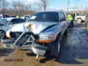 2004 Dodge Dakota Sport with VIN 1D7HG38K44S591424, listed as a IAAI auction lot 41645873 with 135,396 mi miles and . Bid and sale history available at DreamBid. Image 2.