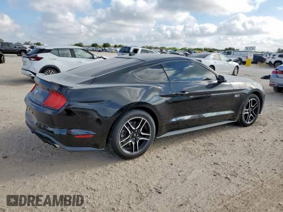 2021 Ford Mustang GT с VIN 1FA6P8CF9M5156508, выставлен на аукционе Copart как лот 83847785 с пробегом 11 154 миль миль и Списание • Salvage title. История ставок и продаж доступна на DreamBid. Изображение 3.