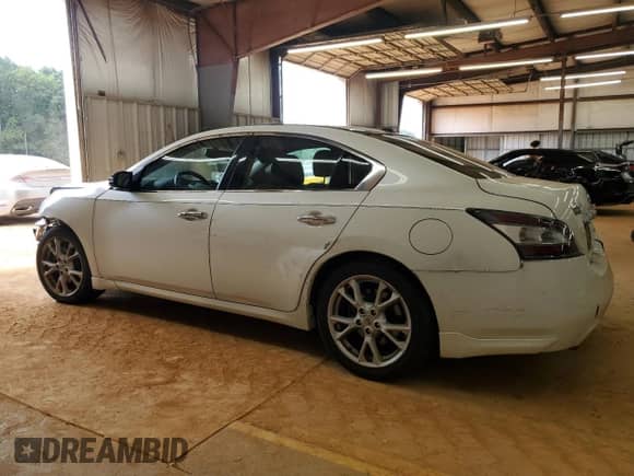 2013 Nissan Maxima S с VIN 1N4AA5AP1DC820592, выставлен на аукционе Copart как лот 83800365 с пробегом 169 338 миль миль и Списание • Salvage title. История ставок и продаж доступна на DreamBid. Изображение 2.