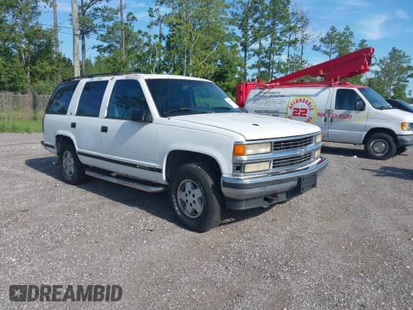 1995 Chevrolet Tahoe z VIN 1GNEK13K7SJ371731, wystawiony jako IAAI lot #42969840 z przebiegiem 274 028 mil mil oraz . Historia ofert i sprzedaży dostępna na DreamBid. Obrazek 1.