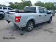 2018 Ford F-150 XL with VIN 1FTEW1CP6JFA35949, listed as a IAAI auction lot 42322549 with 104,044 mi miles and . Bid and sale history available at DreamBid. Image 4.