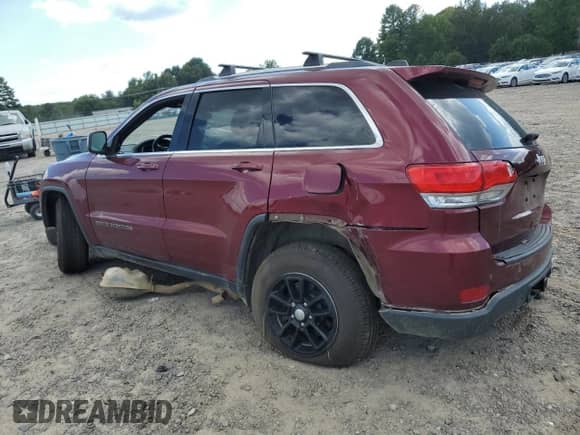 2018 Jeep Grand Cherokee Laredo E с VIN 1C4RJEAG7JC359164, выставлен на аукционе Copart как лот 69985915 с пробегом 125 918 миль миль и Списание • Salvage title. История ставок и продаж доступна на DreamBid. Изображение 2.