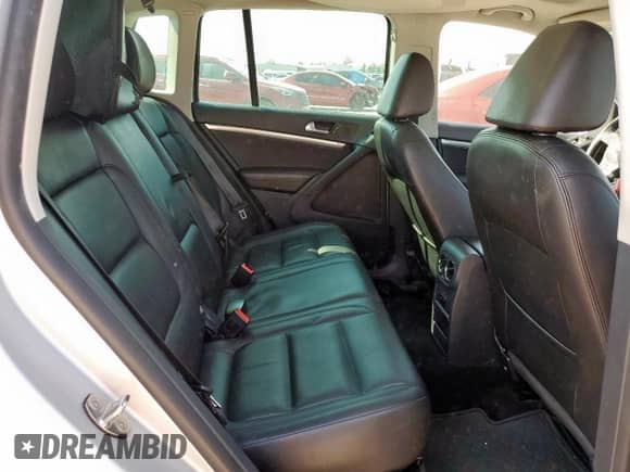 2013 Volkswagen Tiguan S с VIN WVGAV3AX3DW586503, выставлен на аукционе Copart как лот 81014045 с пробегом 103 633 миль миль и Списание • Salvage title. История ставок и продаж доступна на DreamBid. Изображение 11.