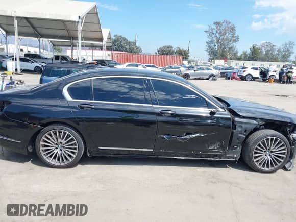 2022 BMW 7 Series 750i xDrive with VIN WBA7U2C00NCK89037, listed as a IAAI auction lot 43061960 with 30,841 mi miles and . Bid and sale history available at DreamBid. Image 14.