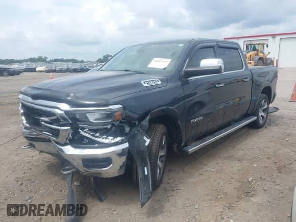 2019 Ram 1500 Laramie with VIN 1C6RREJT9KN600774, listed as a IAAI auction lot 42503737 with 119,880 mi miles and . Bid and sale history available at DreamBid. Image 2.