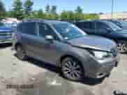 2017 Subaru Forester Touring z VIN JF2SJGWC1HH587274, wystawiony jako Copart lot #68068555 z przebiegiem Nie podano mil oraz Szkoda całkowita • Salvage title. Historia ofert i sprzedaży dostępna na DreamBid. Obrazek 4.
