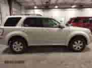 2008 Mercury Mariner with VIN 4M2CU91148KJ42603, listed as a IAAI auction lot 42311239 with 173,554 mi miles and . Bid and sale history available at DreamBid. Image 14.