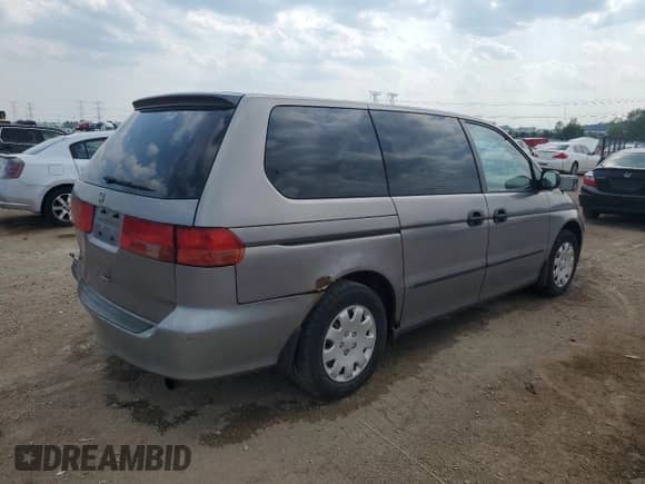 2000 Honda Odyssey LX с VIN 2HKRL1858YH622705, выставлен на аукционе Copart как лот 63376115 с пробегом 265 536 миль миль и Списание • Salvage title. История ставок и продаж доступна на DreamBid. Изображение 3.