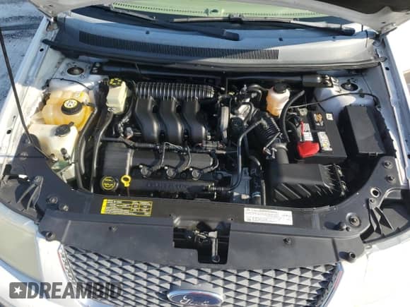 2007 Ford Freestyle SEL с VIN 1FMZK05187GA09013, выставлен на аукционе Copart как лот 71245684 с пробегом 185 059 миль миль и Чистый • Clean title. История ставок и продаж доступна на DreamBid. Изображение 12.