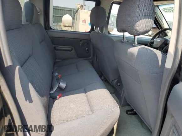 2003 Nissan Frontier XE with VIN 1N6ED29Y03C423496, listed as a Copart auction lot 60175985 with 163,042 mi miles and Salvage title. Bid and sale history available at DreamBid. Image 10.