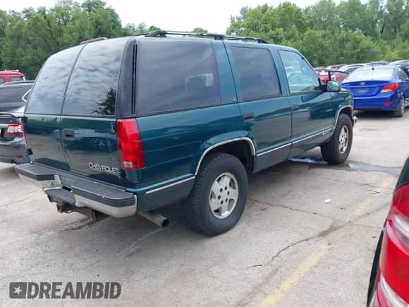 1995 Chevrolet Tahoe with VIN 1GNEK13K3SJ367675, listed as a IAAI auction lot 42854605 with 2,124,982 mi miles and . Bid and sale history available at DreamBid. Image 4.