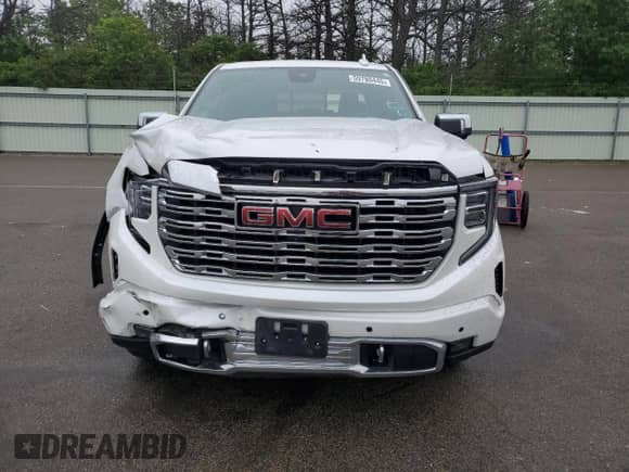 2023 GMC Sierra 1500 Denali z VIN 1GTUUGED3PZ109844, wystawiony jako Copart lot #59780445 z przebiegiem 32 409 mil mil oraz Szkoda całkowita • Salvage title. Historia ofert i sprzedaży dostępna na DreamBid. Obrazek 5.