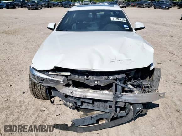 2019 BMW 4 Series 430i with VIN WBA4W3C57KAG91422, listed as a Copart auction lot 71100255 with 91,847 mi miles and Salvage title. Bid and sale history available at DreamBid. Image 5.