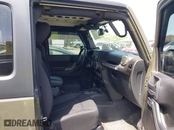 2015 Jeep Wrangler Sport with VIN 1C4AJWAG1FL714131, listed as a IAAI auction lot 42112376 with 81,998 mi miles and . Bid and sale history available at DreamBid. Image 5.