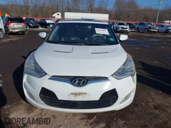 2012 Hyundai Veloster w/Gray Int z VIN KMHTC6AD3CU051669, wystawiony jako IAAI lot #41421833 z przebiegiem 170 000 mil mil oraz . Historia ofert i sprzedaży dostępna na DreamBid. Obrazek 6.