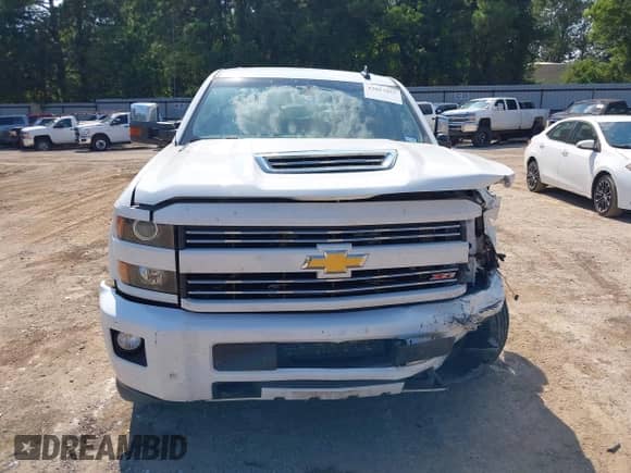 2017 Chevrolet Silverado 2500HD LT z VIN 1GC1KVEY9HF181540, wystawiony jako IAAI lot #43017957 z przebiegiem 198 394 mil mil oraz . Historia ofert i sprzedaży dostępna na DreamBid. Obrazek 12.