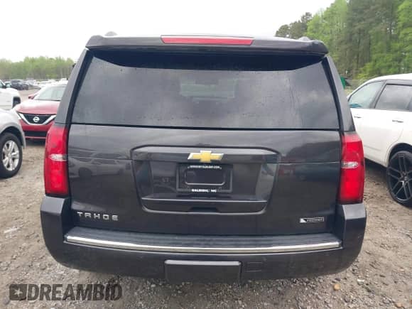 2017 Chevrolet Tahoe Premier with VIN 1GNSKCKC5HR228179, listed as a IAAI auction lot 41957145 with 157,290 mi miles and . Bid and sale history available at DreamBid. Image 16.