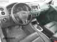 2011 Volkswagen Tiguan S with VIN WVGBV7AXXBW560022, listed as a IAAI auction lot 42693212 with 127,879 mi miles and . Bid and sale history available at DreamBid. Image 16.