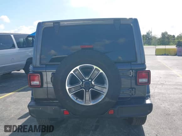 2021 Jeep Wrangler Unlimited Sahara z VIN 1C4HJXEN3MW525716, wystawiony jako IAAI lot #42974390 z przebiegiem 87 931 mil mil oraz . Historia ofert i sprzedaży dostępna na DreamBid. Obrazek 16.