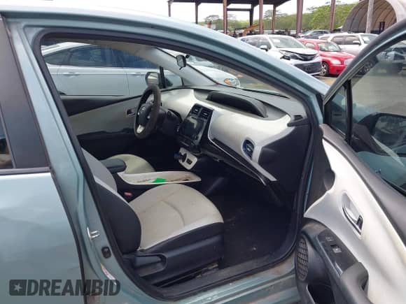 2016 Toyota Prius Three z VIN JTDKARFU1G3014731, wystawiony jako IAAI lot #43200703 z przebiegiem 171 373 mil mil oraz . Historia ofert i sprzedaży dostępna na DreamBid. Obrazek 5.