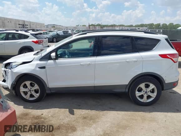 2014 Ford Escape SE с VIN 1FMCU0GX4EUD17571, выставлен на аукционе IAAI как лот 42996750 с пробегом 60 127 миль миль и . История ставок и продаж доступна на DreamBid. Изображение 14.