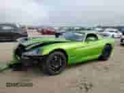 2008 Dodge Viper with VIN 1B3JZ69Z68V200556, listed as a Copart auction lot 46878725 with 28,990 mi miles and Salvage title. Bid and sale history available at DreamBid. Image 1.