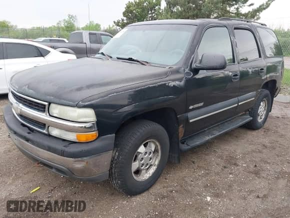 2003 Chevrolet Tahoe LT z VIN 1GNEK13Z43J145919, wystawiony jako IAAI lot #42386094 z przebiegiem 240 118 mil mil oraz . Historia ofert i sprzedaży dostępna na DreamBid. Obrazek 2.