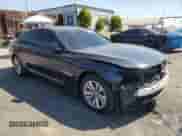 2011 BMW 7 Series 740i with VIN WBAKA4C55BC613170, listed as a Copart auction lot 68973425 with 127,434 mi miles and Salvage title. Bid and sale history available at DreamBid. Image 4.