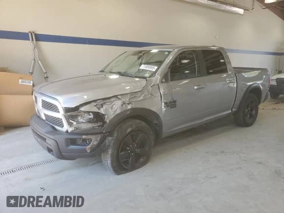 2019 Ram 1500 SLT with VIN 1C6RR7LG9KS671471, listed as a Copart auction lot 71004955 with 82,920 mi miles and Salvage title. Bid and sale history available at DreamBid. Image 1.
