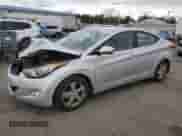 2013 Hyundai Elantra GLS with VIN KMHDH4AE6DU796002, listed as a Copart auction lot 89434355 with 129,754 mi miles and Salvage title. Bid and sale history available at DreamBid. Image 1.