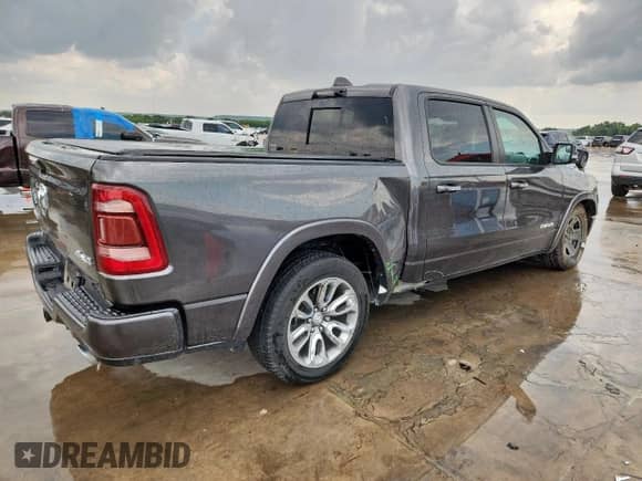2021 Ram 1500 Laramie z VIN 1C6SRFJTXMN548842, wystawiony jako Copart lot #69980945 z przebiegiem 61 163 mil mil oraz Szkoda całkowita • Salvage title. Historia ofert i sprzedaży dostępna na DreamBid. Obrazek 3.