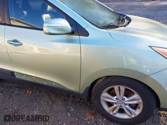 2013 Hyundai Tucson Limited z VIN KM8JUCAC2DU582647, wystawiony jako IAAI lot #43422083 z przebiegiem 145 178 mil mil oraz . Historia ofert i sprzedaży dostępna na DreamBid. Obrazek 6.