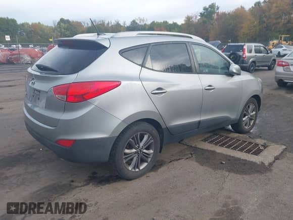 2015 Hyundai Tucson SE with VIN KM8JU3AG1FU116018, listed as a IAAI auction lot 43443014 with 141,816 mi miles and . Bid and sale history available at DreamBid. Image 4.