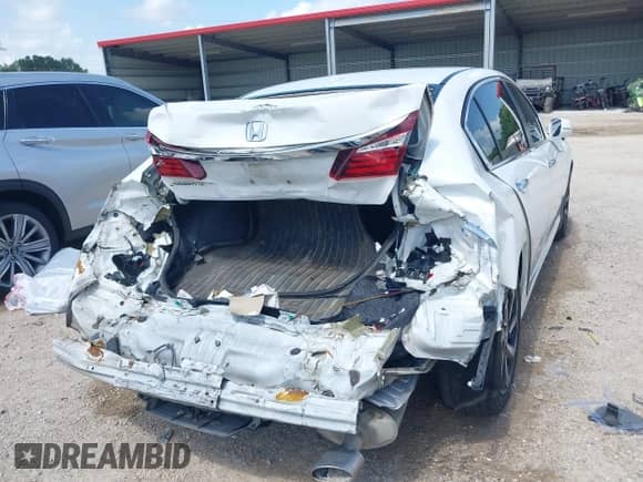2017 Honda Accord EX-L with VIN 1HGCR2F94HA006962, listed as a IAAI auction lot 42539217 with 125,163 mi miles and . Bid and sale history available at DreamBid. Image 6.