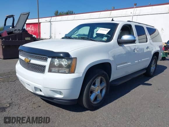 2007 Chevrolet Suburban LS with VIN 1GNFC16J87R405673, listed as a IAAI auction lot 43310963 with 209,248 mi miles and . Bid and sale history available at DreamBid. Image 2.