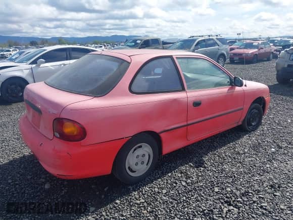 1995 Hyundai Accent z VIN KMHVD14N9SU047038, wystawiony jako IAAI lot #41895712 z przebiegiem 186 094 mil mil oraz . Historia ofert i sprzedaży dostępna na DreamBid. Obrazek 4.