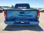 2002 GMC Sierra 1500 SLE with VIN 1GTEC14V82Z124136, listed as a Copart auction lot 63802375 with 77,478 mi miles and Salvage title. Bid and sale history available at DreamBid. Image 6.