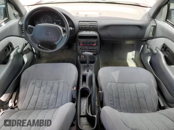 1995 Saturn SL with VIN 1G8ZH5286SZ149862, listed as a Copart auction lot 70059855 with 103,300 mi miles and Salvage title. Bid and sale history available at DreamBid. Image 8.