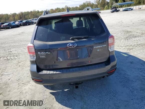 2018 Subaru Forester Premium with VIN JF2SJAGC9JH528376, listed as a Copart auction lot 85673425 with 145,577 mi miles and Salvage title. Bid and sale history available at DreamBid. Image 6.