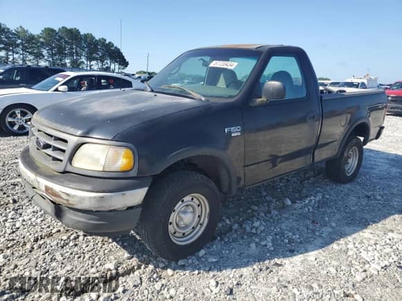 2000 Ford F-150 XL z VIN 1FTRF18W9YNB95521, wystawiony jako Copart lot #57720434 z przebiegiem 203 143 mil mil oraz Czysty tytuł • Clean title. Historia ofert i sprzedaży dostępna na DreamBid. Obrazek 1.