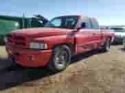 1999 Dodge 1500 z VIN 3B7HC13ZXXG169233, wystawiony jako Copart lot #69402424 z przebiegiem 127 308 mil mil oraz Szkoda całkowita • Salvage title. Historia ofert i sprzedaży dostępna na DreamBid. Obrazek 1.